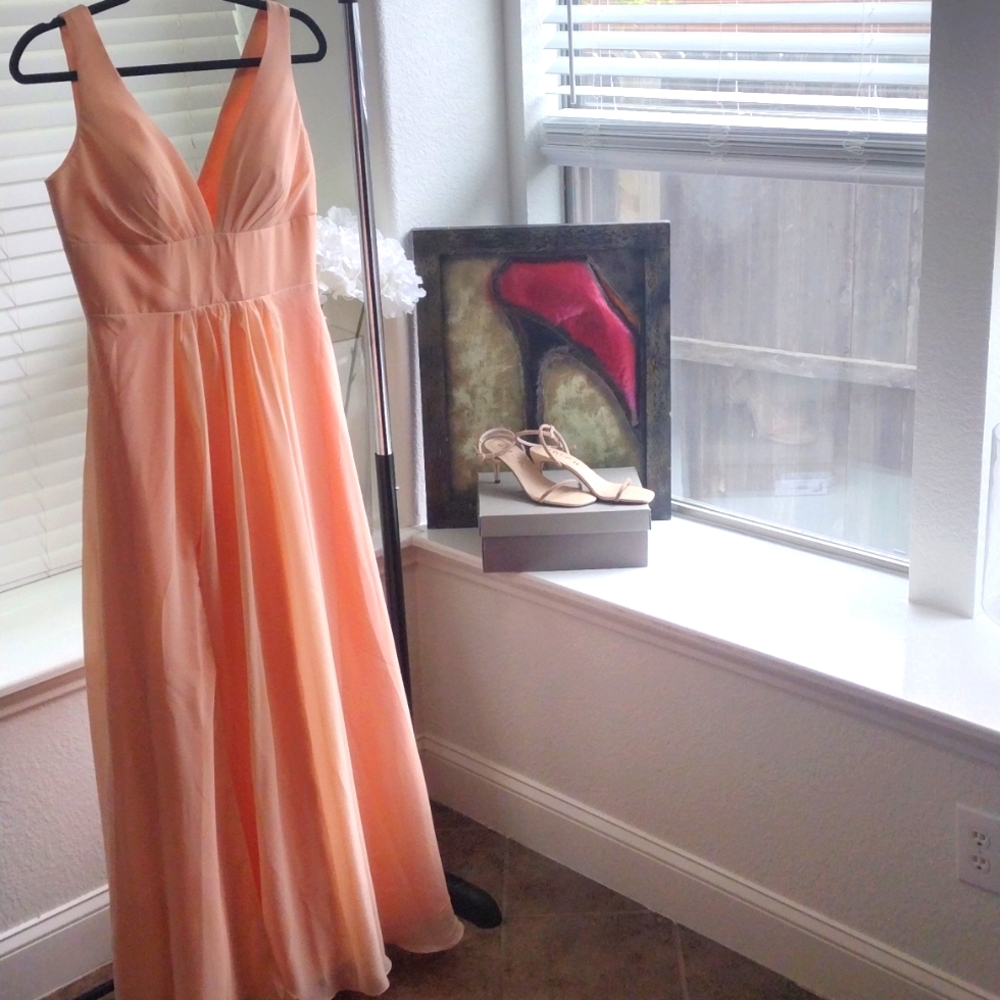 Beautiful Formal Gown.with a side slit. Peach in color size 10